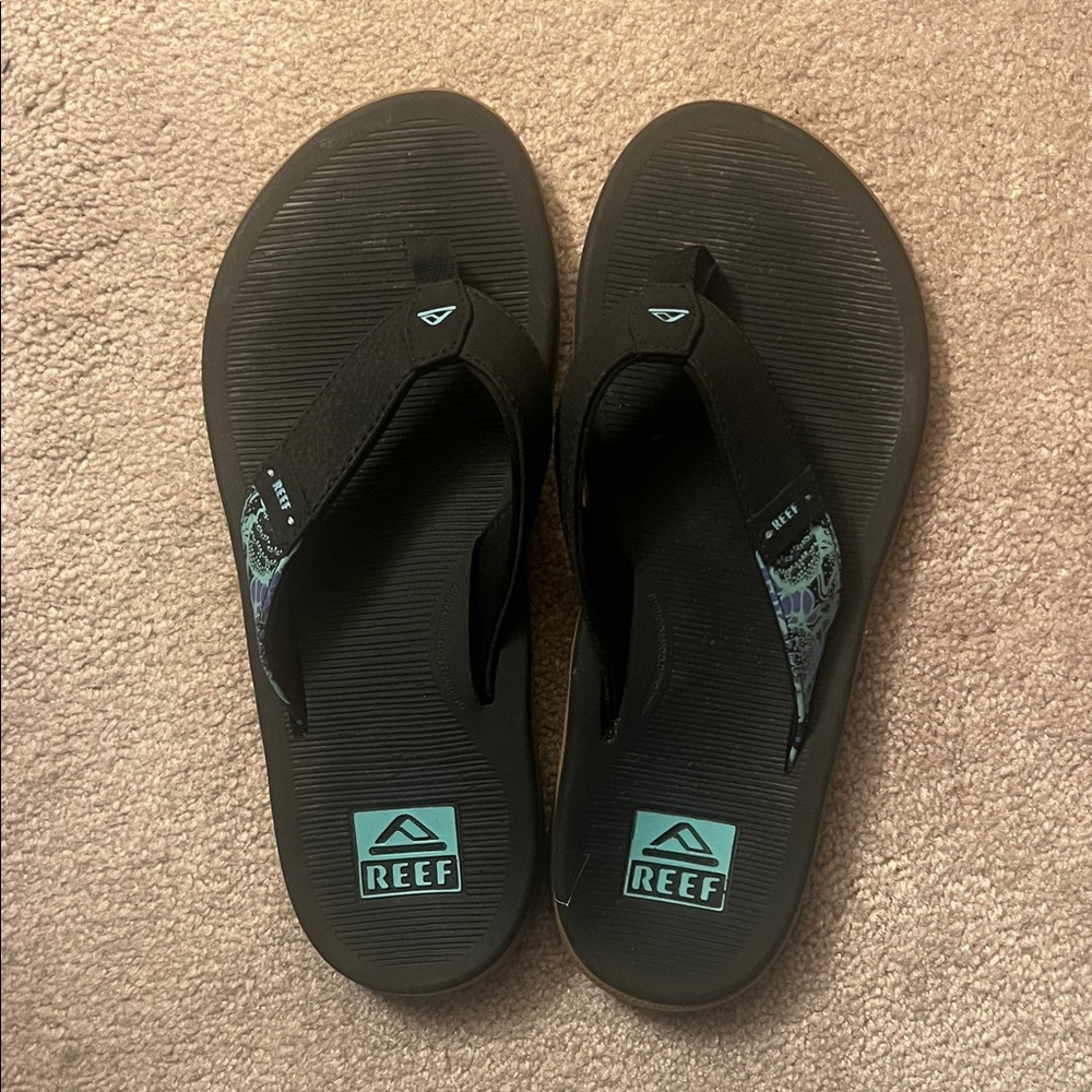 Reef Black Sandals with Aqua Highlights